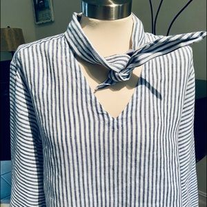 A beautifully  designed linen blouse by Frame.